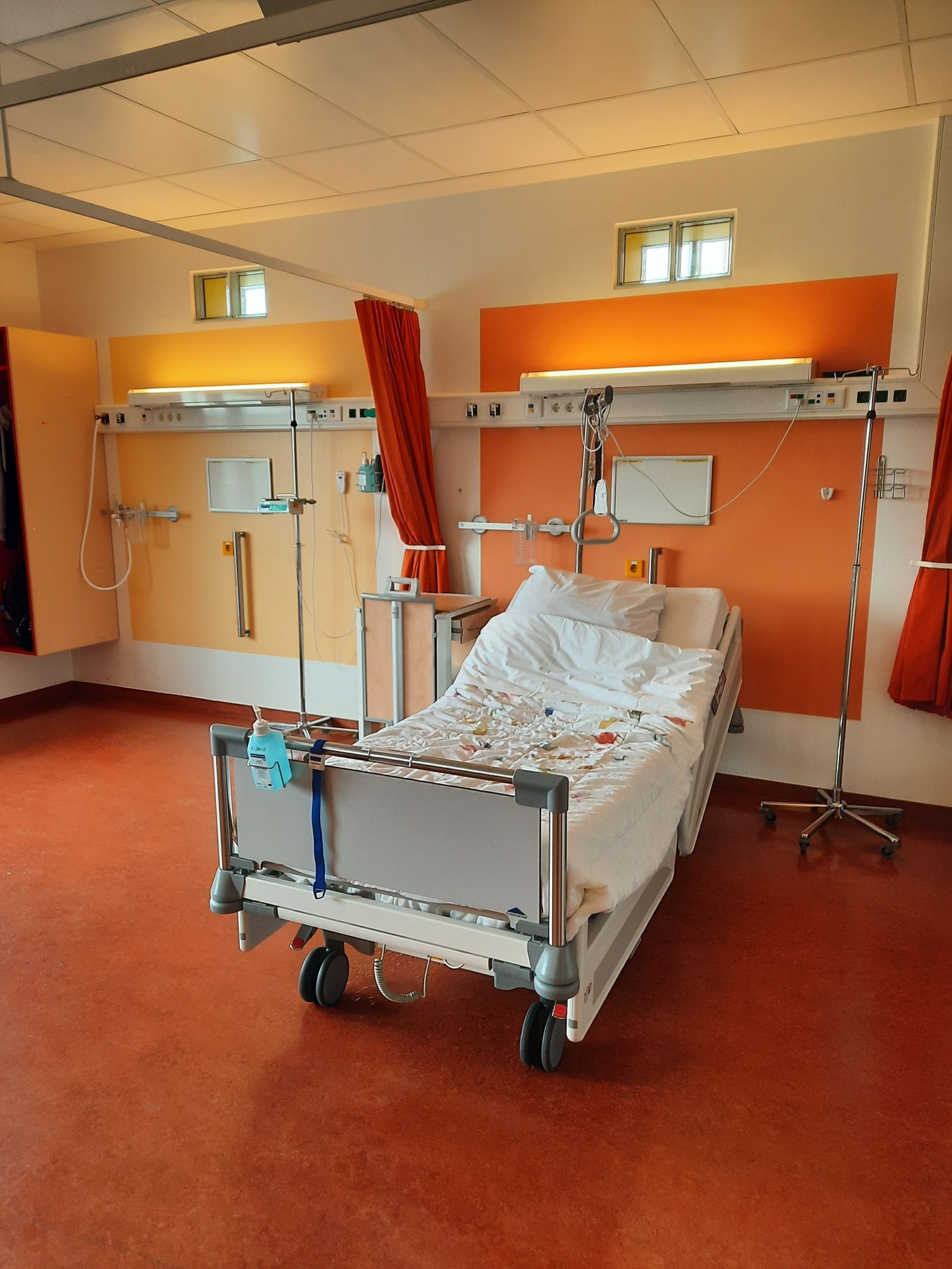 Modern private patient suite with natural light
